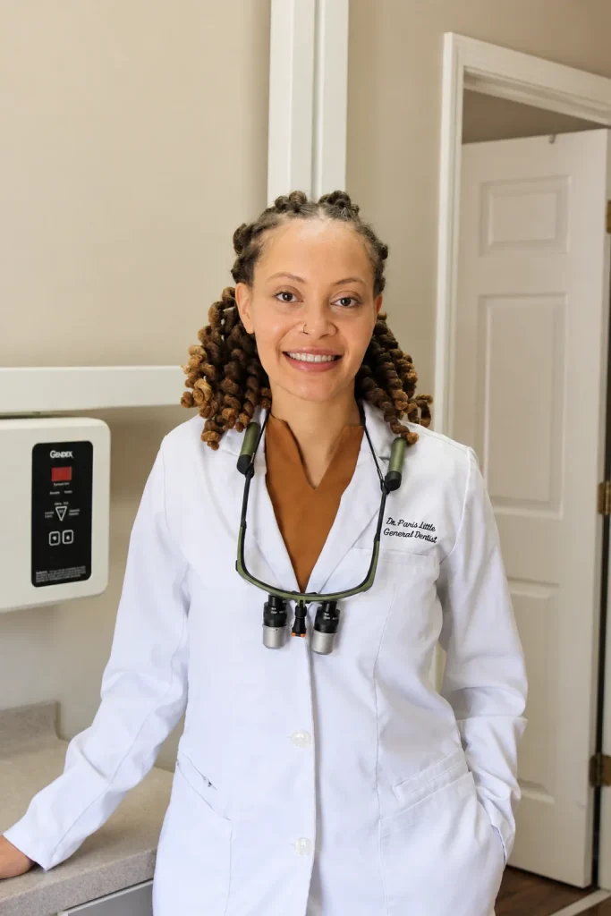 Dr. Paris Little beside the digital X-ray unit at Clarity Dental in McDonough, Georgia